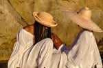 Island Tribe Models Angeline and Red wearing white organic cotton shirts on Malibu Beach, California